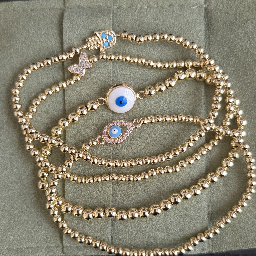 Stainless Steel Gold Toned Beaded Evil Eye Bracelet Set (4 Pieces)